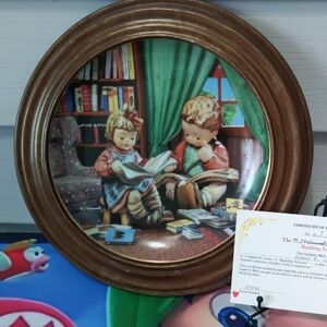 Framed Decorative Plate with Brown Frame and Green Drapes